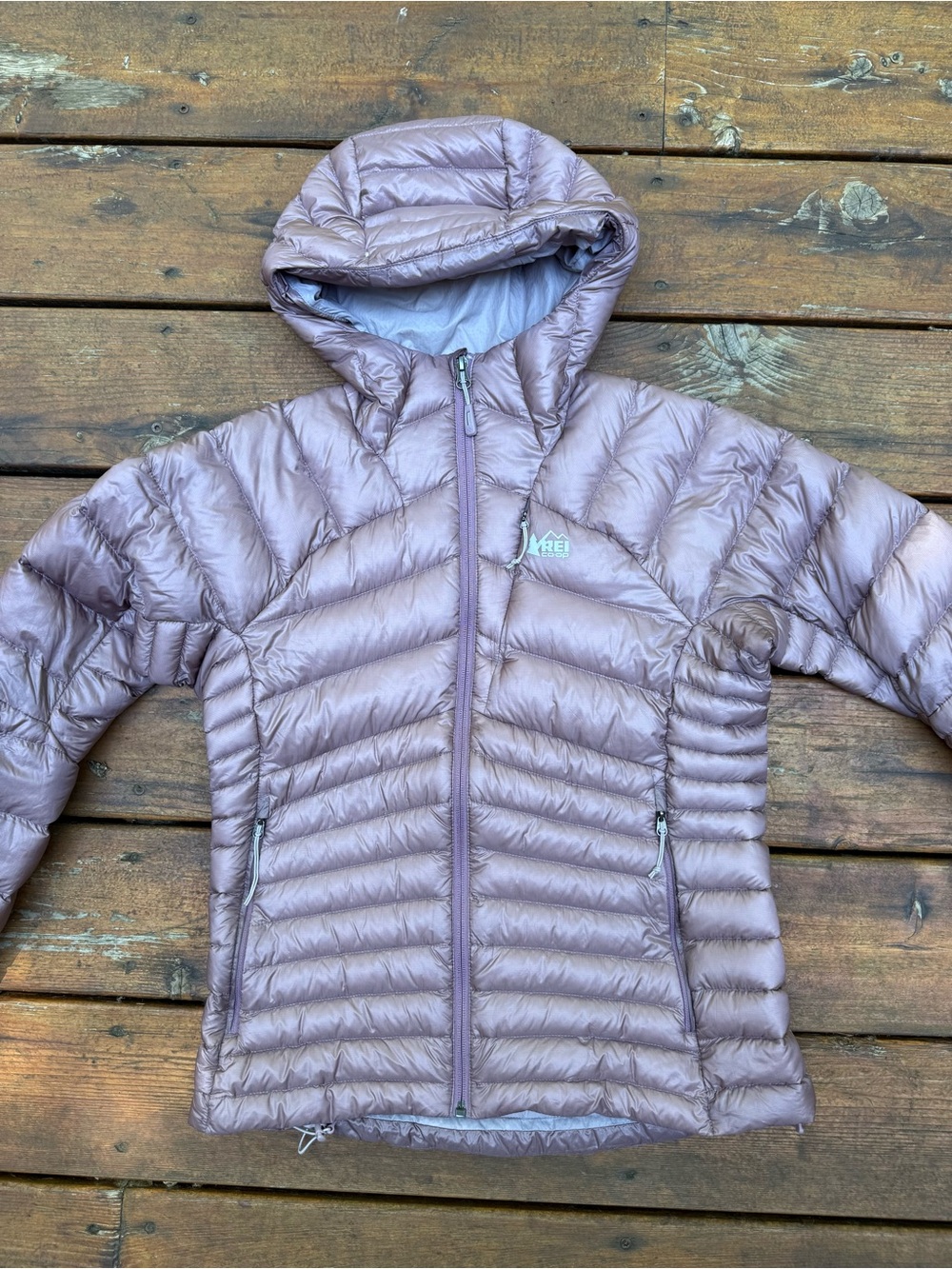 REI Magma 850 down hoodie in pink/mauve